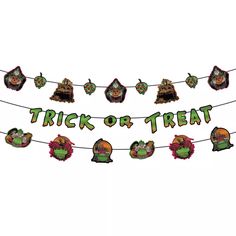 a trick or treat banner hanging from a line