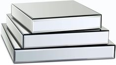 three silver boxes stacked on top of each other