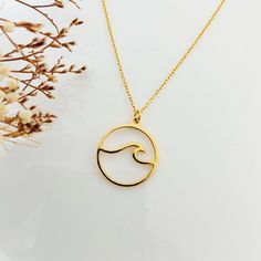 "WAVE NECKLACE , Delicate Ocean Wave necklace, Beach Lover Jewelry , trendy gift for surfer , Ocean is Calling , Dreaming of surfing This minimalist necklace features surfing wave - it gives minimalistic great style for every ocean lover ! You can layer it with wonderful chain0- please check my store:) ♡ DETAILS Diameter: 0.78\"- 20 mm Material: gold plated 24 k over sterling silver 925 ♡ BUYING AS A GIFT? Each item is perfectly wrapped for gift giving or as a wonderful present for you! All item Casual Round Pendant Necklace For Gifts, Minimalist Adjustable Necklaces For Beach, Minimalist Necklaces For Summer Gifts, Casual Round Pendant Jewelry As A Gift, Casual Round Pendant Jewelry Gift, Wave Jewelry, Lover Jewelry, Gifts For Surfers, Wave Necklace