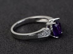 Welcome to my shop, you can find many beautiful gemstone jewelry here, and you also can ask for customized service. Main Stone: amethyst, cushion cut, measures 6X8mmAccent Stones: czMetal: 925 sterling silver plated with rhodium. I also can provide metal options such as 14k solid yellow/white/rose goldSetting: four claw basket settingmore rings: https://www.etsy.com/shop/XCjewelryStudio?ref=hdr_shop_menuIt's a perfect gift for the person who was born in February (Birthstone), it's quite comforta Exquisite Silver Amethyst Ring For Wedding, Elegant Amethyst Birthstone Ring Gift, Silver Amethyst Promise Ring With Diamond Accents, Silver Amethyst Ring With Diamond Accents For Promise, Exquisite Silver Amethyst Ring With Accent Stones, Silver Amethyst Ring With Diamond Accents, Elegant Amethyst Ring With Accent Stones For Gift, Classic Amethyst Ring With Cubic Zirconia For Gift, Classic Cubic Zirconia Amethyst Ring For Gift