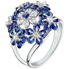 Crafted to perfection, MOISEIKIN's sapphire and diamond ring from Tsvetodelika collection is made with 2.49 carats of radiant diamond-cut blue sapphires and 0.5 carats of diamonds, in which gems dances giving joy of light. Designed as a flower, this feminine yet exquisite sapphire and diamond ring will enchant you. What sets this ring apart is the revolutionary international patented technology that lies at its core. Ingeniously engineered, the gemstones within the ring possess the ability to ro Luxurious Jewelry, Heritage Jewellery, Silver Party, White Gold Sapphire, Diamond Fashion Rings, Radiant Diamond, 18k Gold Ring, Sapphire Diamond Ring, Cz Ring