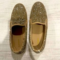 Step Up Your Style Game With These Stunning Gold Glitter Slip-On Tennis Shoes. Designed For Those Who Love A Touch Of Sparkle, These Shoes Combine Casual Comfort With Eye-Catching Glamour. The Shimmering Gold Glitter Finish Adds A Bold, Playful Vibe To Any Outfit, While The Slip-On Design Makes Them Easy To Wear For Any Occasion. With A Cushioned Insole And Flexible Sole, These Shoes Ensure All-Day Comfort Without Compromising On Style. Whether You're Running Errands Or Heading Out With Friends, Glitter Tennis Shoes, Slip On Tennis Shoes, Navy Shoes, Navy Gold, Tennis Shoes, Step Up, Gold Glitter, Running Errands, Womens Shoes Sneakers