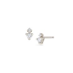 A beautiful double-diamond spark - dainty enough for any piercing, and with just enough sparkle to catch the eye. Inspired by twinkling stars in the night sky, the Spark Studs are constructed of 14k gold and sold as singles. Shown on model with the Andromeda Curves, Studs and Double Stick earrings. ◆ Made to order ◆ Approximately 3/8" long ◆ Recycled 14k Gold ◆ Recycled Diamonds: 1.7mm (.06tcw) ◆ High polish finish Dainty White Gold Earrings With Single Cut Diamonds, Dainty White Gold Diamond Earrings With Single Cut Diamonds, Dainty White Gold Diamond Earrings With Brilliant Cut, Dainty White Gold Diamond Earrings, Dainty Diamond Earrings With Single Cut Diamonds, Stick Earrings, Twinkling Stars, Double Diamond, Twinkle Star