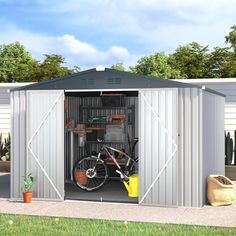 a bike is parked in the side of a metal shed