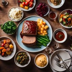 a table topped with plates of food and bowls of sauces on top of it