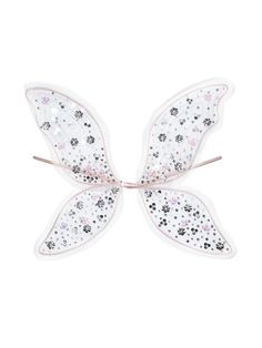 a white and black butterfly with stars on it's wings