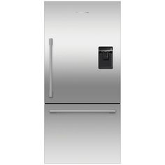 a silver refrigerator freezer sitting on top of a white counter