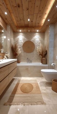 a large bathroom with wooden ceiling and tile flooring, along with a white bathtub