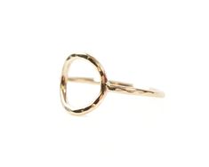 Experience the artistry of simplicity with our Petite Circle Ring, meticulously hand-forged and made to order by our esteemed artisans. This delicate pinky ring not only adds a touch of sweet and simple sparkle but also embodies sustainability in style. Each petite circle, measuring about 7/16” across, is meticulously shaped and receives a delicate hammered texture by the skilled hands of our artisans. This hand-forged process ensures that every ring is a unique masterpiece. Crafted from your ch Simple Hammered Ring Jewelry, Adjustable Initial Ring For Everyday, Hand Forged Open Ring Jewelry For Everyday, Delicate Adjustable Initial Ring, Hand-forged Ring Jewelry For Everyday, Everyday Hand Forged Ring, Elegant Hammered Midi Rings For Gift, Hand Forged Modern Everyday Ring, Modern Hand Forged Everyday Ring