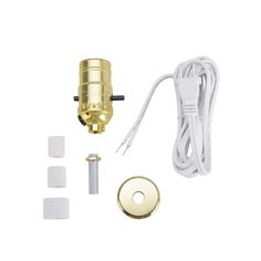 an image of a gold colored water fountain faucet and accessories set up on a white background