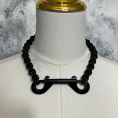 🔗 Features a large front industrial strength bolt snap clasp and chunky chainmail chain in the blackest shade of black. Chain was hand woven using a triple ring weave.  🔗Measures approximately 19" in length total with the actual chain portion measuring 16". The front clasp is the only clasp so make sure the length will suit your neck. Use the actual chain length (16") to determine if it will be a good fit. Let me know when ordering if you need a different chain length.  🔗The rings of the chai Black Chain Link Necklace For Party, Punk Style Black Metal Chain Necklace, Edgy Black Chain Necklace For Party, Black Chain Link Edgy Jewelry, Trendy Black Chain Link Necklace, Edgy Black Chain Link Jewelry, Trendy Black Link Jewelry, Black Punk Chain Choker Necklace, Punk Black Chain Choker Necklace