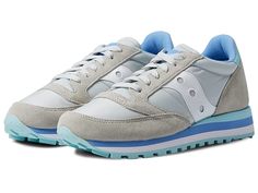 Saucony Originals Jazz Triple - Women's Shoes : Grey/Blue : Stretch your legs and feet in the comfort of the Saucony Originals Jazz Triple sneaker. Textile and synthetic upper. Lace-up closure. Round-toe silhouette. Textile lining and insole. Synthetic outsole. Imported. Measurements: Weight: 10 oz Product measurements were taken using size 8.5, width B - Medium. Please note that measurements may vary by size. Weight of footwear is based on a single item, not a pair. Slip-resistant Sneakers For Jogging With White Sole, Comfortable Nylon Lace-up Sneakers, Casual Nylon Slip-resistant Sneakers, Comfortable Nylon Sneakers For Sports, Comfortable Slip-resistant Lace-up Sneakers, Casual Nylon Lace-up Walking Shoes, Casual Low-top Slip-resistant Running Shoes, Nylon Running Shoes With Rubber Sole And Round Toe, Slip-resistant High-top Walking Shoes