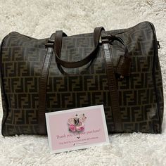 This Is A Great Bag, Very Lite Weight. Great Collection. Matching Suitcase, & Train Case In Separate Listing. Comes With Dust Bag & Strap! Designer Monogram Canvas Travel Bag, Designer Brown Monogram Canvas Travel Bag, Brown Travel Bag With Dust Bag, Elegant Brown Monogram Canvas Travel Bag, Train Case, Fendi Bags, Duffel Bag, Bag Straps, Travel Bags