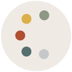 a white circle with different colored dots on it