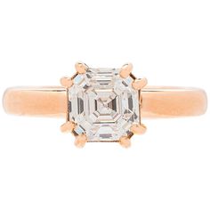 An original modern yet timeless design showcasing an exceptional diamond. This 1.68 carat Asscher Square emerald cut diamond is set in an 18 karat rose gold mounting with split double prongs. The diamond boasts Internally Flawless clarity and G color, accompanied by GIA report #13379320. Currently a size 6.5, the ring can easily be resized to fit almost any finger. A design fit for a bride who wants to stand out in a crowd, but still appreciates fine quality and craftsmanship. Square Cut Ring, Platinum Halo Ring, Square Cut Rings, Edwardian Engagement Ring, Victorian Engagement Rings, Emerald Cut Diamond Engagement, Contemporary Engagement Rings, Platinum Diamond Engagement Rings, Ruby Diamond Rings