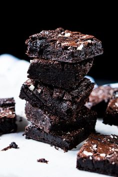 chocolate brownies stacked on top of each other with the words chocolate brownies above them