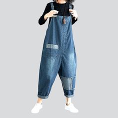 Make a statement this season with our new-millennium-style 2023 Autumn Collection Patchwork Denim Jumpsuit! Boasting a loose fit. patchwork-style design. and suspenders closure. this one-of-a-kind piece is perfect for those who want to stay ahead of the trend.Distinctive Features: Y2K Style: Take a trip back in time with our vintage-inspired Y2k-style denim jumpsuit! Patchwork Design: Our denim jumpsuit features patchwork-style patches on the legs for a unique. edgy look. Baggy Fit: Our jumpsuit Denim Blue Bib Front Jumpsuit And Rompers, Casual Denim Patchwork Overalls Jumpsuit, Casual Blue Denim Jumpsuit With Patchwork, Casual Baggy Patchwork Overalls, Casual Patchwork Jumpsuits And Rompers For Fall, Casual Denim Overalls With Patchwork, Summer Denim Patchwork Jumpsuit, Denim Blue Patchwork Cotton Overalls, Denim Patchwork Jumpsuit Overalls