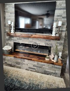 a flat screen tv mounted above a fireplace