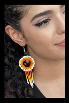 These earrings reflect the cultural traditions of indigenous artisans from Chiapas Mexico. It can take up to an hour to finish every pair. We know you're going to love them as much as we do! They are lightweight and add a pop of color to any outfit. Easy to wear from day to night.  As a special thank you every shipment will receive a FREE GIFT!! Thank you for visiting - Gracias por visitarnos!  Be sure to favorite our shop to get updates on all our new items! Artisan Orange Beaded Earrings, Traditional Hoop Jewelry With Colorful Beads, Traditional Hoop Earrings With Colorful Beads For Gift, Handmade Traditional Orange Beaded Earrings, Orange Teardrop Jewelry For Festivals, Traditional Beaded Hoop Earrings As Gift, Traditional Beaded Hoop Jewelry, Traditional Handmade Hoop Beaded Earrings, Traditional Adjustable Beaded Earrings With Ear Wire