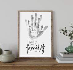 a framed print with the words family on it