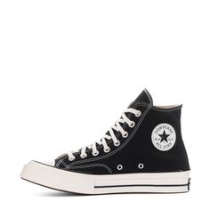 By 1970, the Chuck Taylor All Star evolved into one of the best basketball sneakers ever. The Converse Chuck 70 celebrates that heritage by combining archival-inspired details with modern comfort updates. Ortholite insole cushioning and winged tongue stitching take the comfort level up a notch. A glossy midsole and signature star ankle patch bring out the shoe's iconic, vintage style. Runs a half-size large. High-top shoe with canvas upper. Winged tongue stitching helps lock it in place. Vintage Classic Basketball Shoes With Vulcanized White Sole, Vintage Basketball Shoes With Boost Midsole, Classic Converse High-top Sneakers For Sports, Vintage Sneakers With Cushioned Footbed For Streetwear, Vintage Basketball Shoes With Boost Midsole And Round Toe, Vintage Cushioned Sneakers For Streetwear, Classic Converse High-top Sneakers With Rubber Toe Cap, Classic High-top Sneakers With Cushioned Footbed For Streetwear, Classic Converse Sneakers With Cushioned Footbed