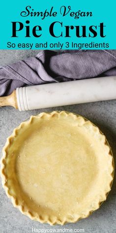 an uncooked pie crust sitting on top of a counter next to a rolling pin