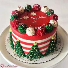 a red and white christmas cake on a plate