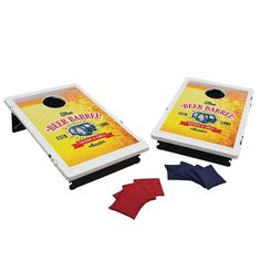 two beer themed cornhole game boards with napkins on the side and one in front