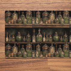 a shelf filled with lots of glass bottles on top of wooden shelves next to each other