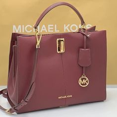 Michael Kors Penelope Large Top Handle Satchel Merlot Multi Color Leather Introducing Penelope, A Classic Satchel That You’ll Be Reaching For Again And Again. It’s Crafted From Smooth Leather With Luxe Python-Embossed Accents, While Its Fully-Lined Interior Is Divided Into Two Main Interior Compartments For Easy Organization. The Removable Crossbody Strap Renders It The Perfect Piece For About-Town Adventures Satchel Leather Trim: 100% Polyurethane Gold-Tone Hardware 15.5”W X 10”H X 5”D Handle D Brown Leather Satchel, Michael Kors Satchel, Michael Kors Tote Bags, Black Satchel, Satchel Tote Bag, Faux Leather Belts, Easy Organization, Black Leather Handbags, Purses Michael Kors