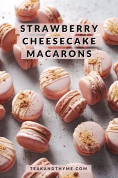 strawberry cheesecake macarons on a baking sheet with the words, strawberry cheesecake macaroons