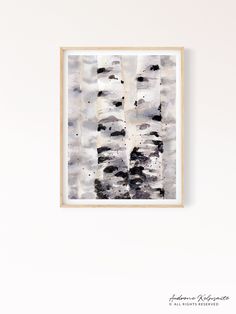 an abstract painting with black and white paint on the wall in front of a white wall