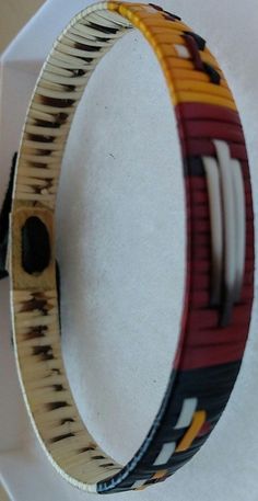 a bracelet made out of strips of wood