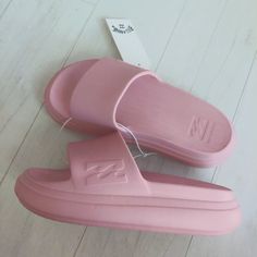 Billabong Cushion Platform Slides Sandals Pink Perfect For A Quick Errand, A Trip To The Beach Or Lounging Around The House, Our Soft Platform Slide Sandals Are Cute, Fun And Comfortable. Featuring A Chunky, Platform Base, The Cushion Slides Are Soft, Springy And Light As A Cloud For Fashionable, Yet Functional Everyday Footwear A Super-Cushy Slide With An Elevated Look And Feel. The Billabong Cushion Slip-On Pairs A Rebounding Eva Outsole And Footbed With Over-The-Top Comfort. Water-Friendly & Pink Flat Summer Slippers, Pink Slip-on Summer Slippers, Pink Summer Slip-on Slippers, Pink Slide Sandals For Summer, Pink Summer Slide Sandals, Pink Beach Slippers Slide Shape, Pink Beach Slide Slippers, Pink Closed Toe Slippers For Beach, Pink Closed Toe Beach Slippers