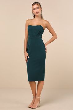 The Lulus Gorgeously Sultry Emerald Green Bustier Strapless Midi Dress will call in compliments the moment you slip it on! Stretchy crepe knit falls from a sweetheart-style neckline (with hidden no-slip strips) into a strapless, bustier-inspired bodice with raised seaming and supportive side boning. High, fitted waist sits atop a bodycon skirt that flaunts your curves perfectly before ending at a midi hem. Kick pleat at back for movement. Hidden back zipper/clasp. Fit: This garment runs small - Casual Formal Dresses, Homecoming Outfits, Strapless Bustier, Lulu Fashion, Strapless Midi Dress, Casual Wedding Dress, Bodycon Skirt, C Cup, Kick Pleat