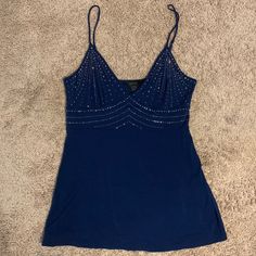 Bnwt Stunning Express Embellished Dk Blue Tank Top Size L This Top Is Fabulous! So Much Sparkle. Even Better In Person Elegant Blue Embellished Top, Blue Embellished Sleeveless Top, Blue Embellished V-neck Top, Embellished Blue V-neck Top, Blue Embellished Top For Evening, Linen Crop Top, Racerback Top, Orange Top, Floral Tank Top