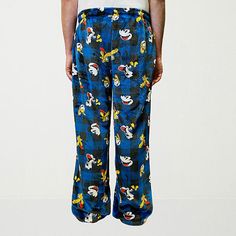 Prep for bedtime in these fun, cozy Mickey and Friends graphic pajama pants for men. Made from a super-soft and warm printed fleece, they have a comfortable elastic-drawstring waist, a button-fly and side pockets. Team it with your favorite pajama top or t-shirt. Features: Button FlyCharacter: Mickey And FriendsClosure Type: Drawstring, Full ElasticPockets: 2 Side Slip PocketsApparel Length: 49.75 InchesFiber Content: 100% PolyesterFabric Description: FleeceInseam: 32 InCare: Tumble Dry, Machin… Friends Graphic, Fleece Pajama Pants, Pants Blue, Pants For Men, Mens Fleece, Pajama Top, Mickey And Friends, Pants Color, Drawstring Waist