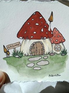 a drawing of a mushroom house on paper