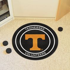 the tennessee volunteers rug is on the floor