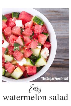 a watermelon salad in a white bowl on top of a wooden table with the words easy watermelon salad