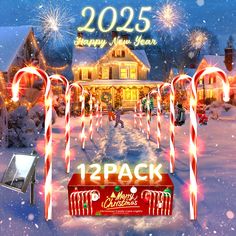 a christmas scene with candy canes and lights in front of a house that says happy new year