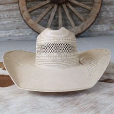 100X Straw Crown: 4 1/2" Brim: 5" Front: 7" Long Oval Sizes: 6 3/4 - 7 3/4 Made in USA Hand Shaped crown & brim will vary slightly. Straw Cowboy Hat, Hand Shapes, Cowboy Hat, Hat Sizes, Cowboy Hats, Made In Usa, Straw, Cowboy, Crown