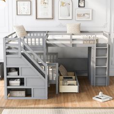 there is a loft bed with stairs and storage under the bed, next to a desk