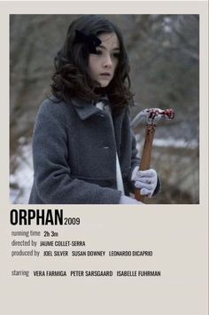 a poster for an upcoming show called orphan, featuring a woman holding a stick