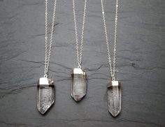 "Raw quartz crystal plated in silver on a sterling silver chain (custom length to your preference.) These raw, uncut stones are from Spain. Quartz provides clarity and positivity. The most abundant mineral in the world Quartz is known as the master healing crystal amplifying stability and healing. Your one-of-a-kind necklace will arrive in a gift box and on a hang tag noting the metaphysical properties of the crystal. Stone: Quartz, raw points Size: select from 4 available options Color: Clear w Raw Quartz Necklace, Crystal Necklace Silver, Rough Quartz, Raw Quartz Crystal, Ideas Jewelry, Crystal Pendants, Gemstone Pendants, Raw Quartz, Quartz Crystal Necklace