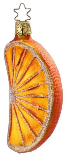 an orange ornament hanging from a string on a white background with gold glitters