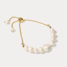 This exquisite Baroque Pearl Bracelet features an incredibly delicate chain that delicately drapes around the wrist while encasing a single stunning baroque pearl. Its sophisticated design, expert craftsmanship, and exclusive materials create an elegant look that exudes exquisite taste. DETAILS Plating: 18k Gold on Brass Materials:   18K Gold on Brass, Freshwater Pearl Measurements: Length: 3.54"(9.0cm) + Extender: 5.51"(14.0cm) Weight:  9.52g Note: It will be in stock in 7 business days! Pearl Jewelry Wedding, Bracelet Pearl, Delicate Chain, Sophisticated Design, Pearl Chain, Nature Jewelry, Brass Material, Baroque Pearls, Pearl Bracelet