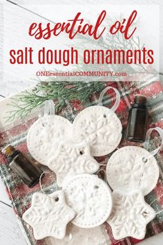 salt dough ornaments on a plaid cloth with rosemary essential oil in the background and text overlay