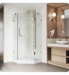 a bathroom with a sink, mirror and shower stall in the middle of it's wall