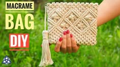 a hand holding a macrame bag with tassels on it and text overlay that reads, macrame bag diy